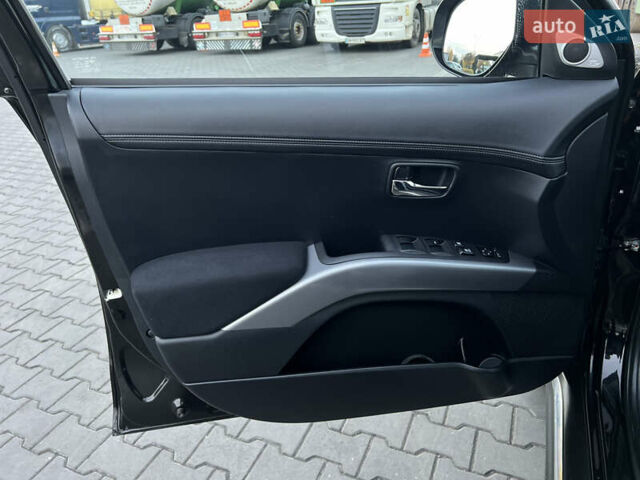 Чорний Міцубісі Аутлендер, об'ємом двигуна 2.3 л та пробігом 124 тис. км за 11999 $, фото 73 на Automoto.ua