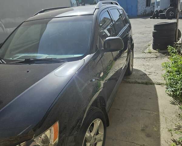 Чорний Міцубісі Аутлендер, об'ємом двигуна 2.36 л та пробігом 164 тис. км за 10800 $, фото 4 на Automoto.ua