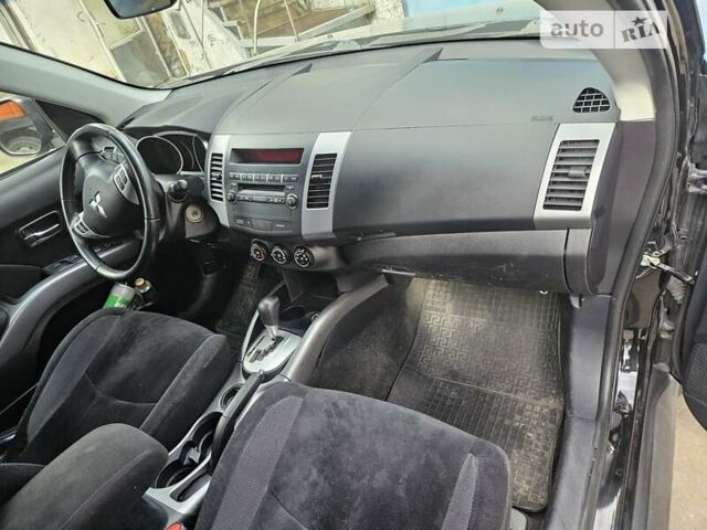 Чорний Міцубісі Аутлендер, об'ємом двигуна 2.36 л та пробігом 164 тис. км за 10800 $, фото 5 на Automoto.ua