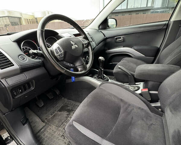 Чорний Міцубісі Аутлендер, об'ємом двигуна 2.36 л та пробігом 96 тис. км за 11700 $, фото 15 на Automoto.ua