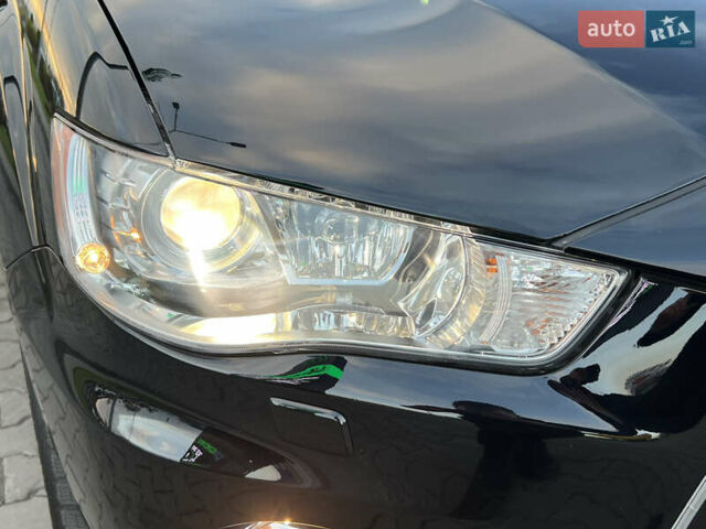 Чорний Міцубісі Аутлендер, об'ємом двигуна 2.3 л та пробігом 124 тис. км за 11999 $, фото 11 на Automoto.ua