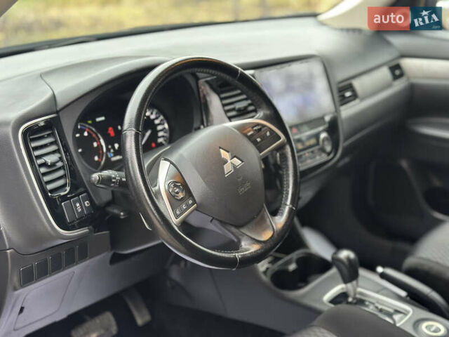 Чорний Міцубісі Аутлендер, об'ємом двигуна 2.2 л та пробігом 176 тис. км за 13500 $, фото 17 на Automoto.ua