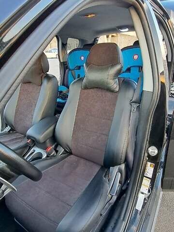 Черный Мицубиси Аутлендер, объемом двигателя 2.36 л и пробегом 285 тыс. км за 11300 $, фото 9 на Automoto.ua