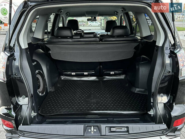 Чорний Міцубісі Аутлендер, об'ємом двигуна 2.3 л та пробігом 124 тис. км за 11999 $, фото 87 на Automoto.ua