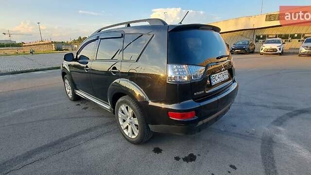 Черный Мицубиси Аутлендер, объемом двигателя 2.36 л и пробегом 285 тыс. км за 11300 $, фото 28 на Automoto.ua