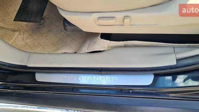 Черный Мицубиси Аутлендер, объемом двигателя 2.27 л и пробегом 195 тыс. км за 10500 $, фото 19 на Automoto.ua