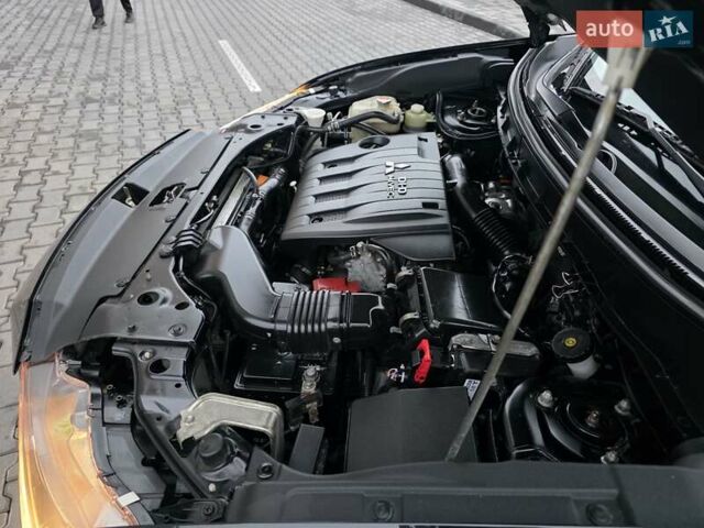 Черный Мицубиси Аутлендер, объемом двигателя 2.2 л и пробегом 188 тыс. км за 10999 $, фото 25 на Automoto.ua