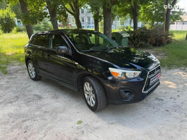 Черный Мицубиси Аутлендер, объемом двигателя 2 л и пробегом 195 тыс. км за 9990 $, фото 2 на Automoto.ua