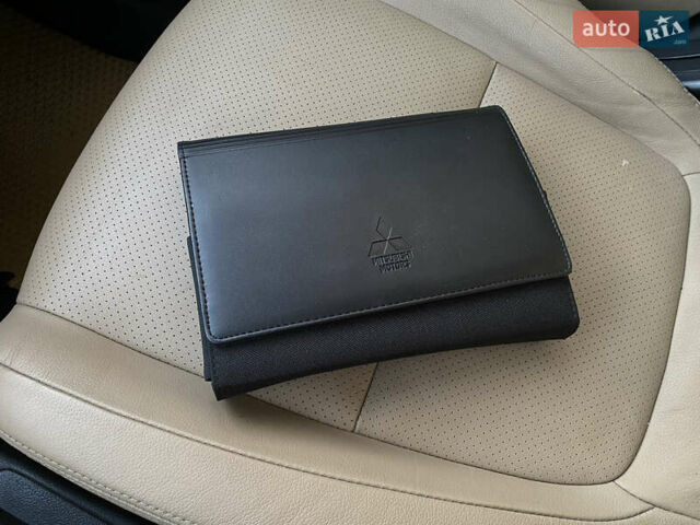 Черный Мицубиси Аутлендер, объемом двигателя 2.27 л и пробегом 241 тыс. км за 14400 $, фото 75 на Automoto.ua