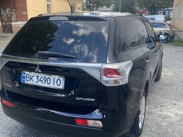 Черный Мицубиси Аутлендер, объемом двигателя 2 л и пробегом 168 тыс. км за 12007 $, фото 6 на Automoto.ua