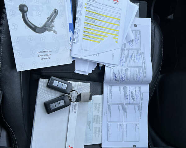 Черный Мицубиси Аутлендер, объемом двигателя 2 л и пробегом 190 тыс. км за 12500 $, фото 35 на Automoto.ua