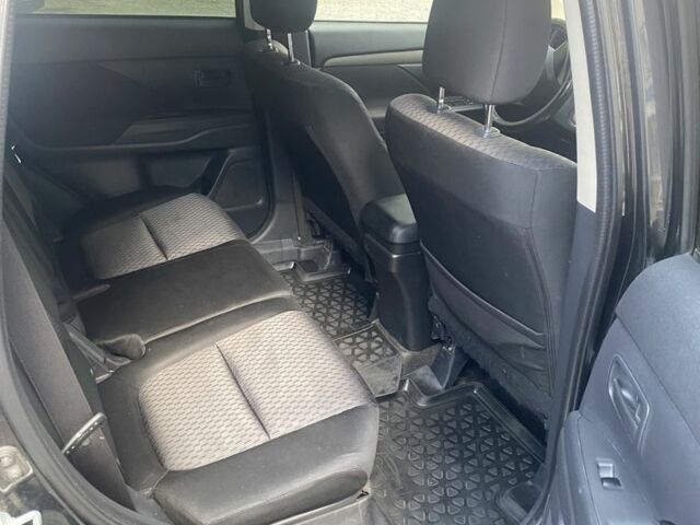 Черный Мицубиси Аутлендер, объемом двигателя 2 л и пробегом 168 тыс. км за 12007 $, фото 5 на Automoto.ua