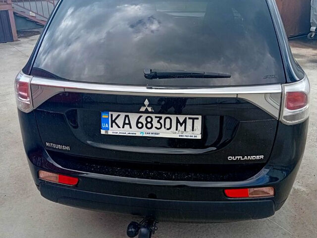 Черный Мицубиси Аутлендер, объемом двигателя 2.4 л и пробегом 180 тыс. км за 9500 $, фото 3 на Automoto.ua