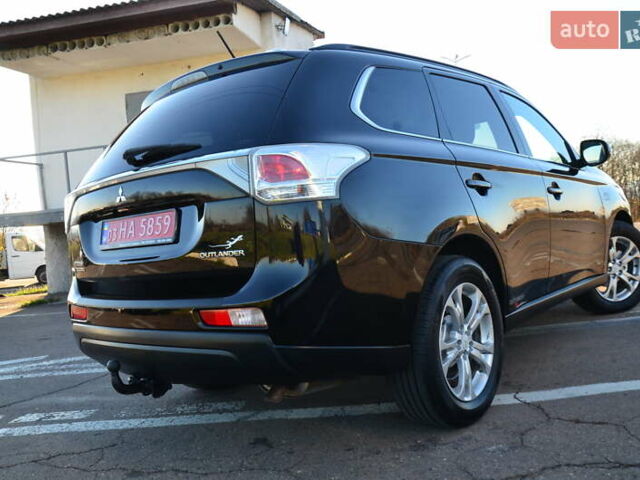 Чорний Міцубісі Аутлендер, об'ємом двигуна 2.2 л та пробігом 237 тис. км за 12550 $, фото 31 на Automoto.ua