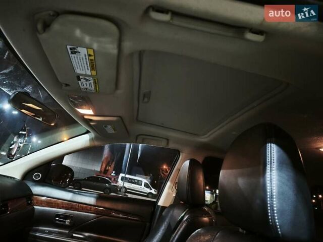 Черный Мицубиси Аутлендер, объемом двигателя 2.36 л и пробегом 226 тыс. км за 12499 $, фото 31 на Automoto.ua