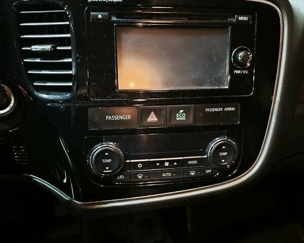 Черный Мицубиси Аутлендер, объемом двигателя 2.36 л и пробегом 226 тыс. км за 12499 $, фото 20 на Automoto.ua