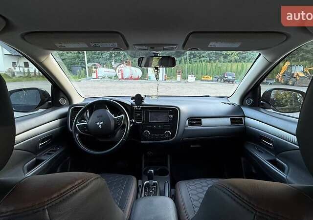 Мицубиси Аутлендер 2013 в Львове на Automoto.ua Черный Мицубиси Аутлендер, объемом двигателя 2.4 л и пробегом 236 тыс. км за 13000 $, фото 6 на Automoto.ua