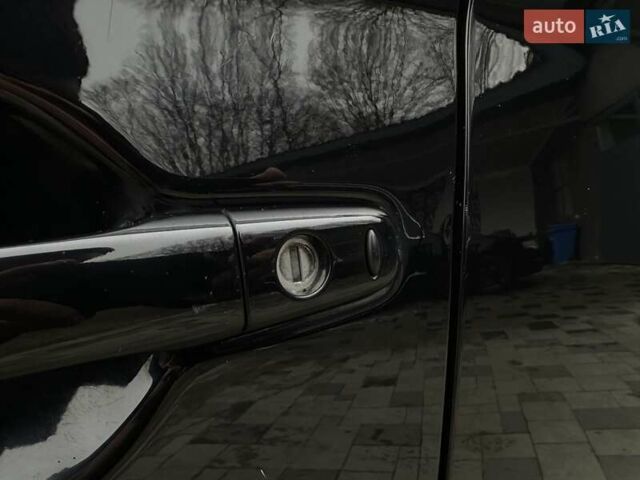 Чорний Міцубісі Аутлендер, об'ємом двигуна 2 л та пробігом 213 тис. км за 13888 $, фото 36 на Automoto.ua