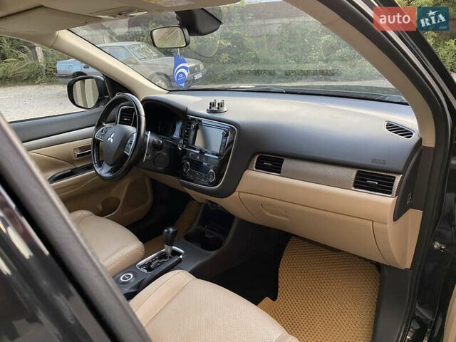 Черный Мицубиси Аутлендер, объемом двигателя 2.27 л и пробегом 241 тыс. км за 14400 $, фото 27 на Automoto.ua