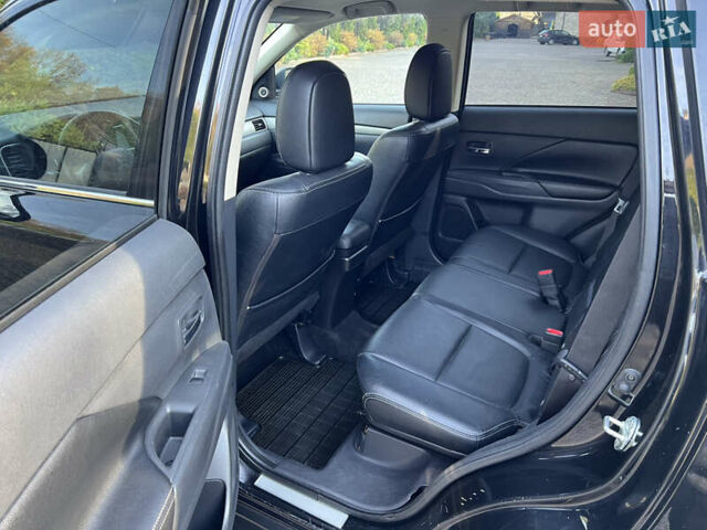 Черный Мицубиси Аутлендер, объемом двигателя 2 л и пробегом 190 тыс. км за 12500 $, фото 21 на Automoto.ua