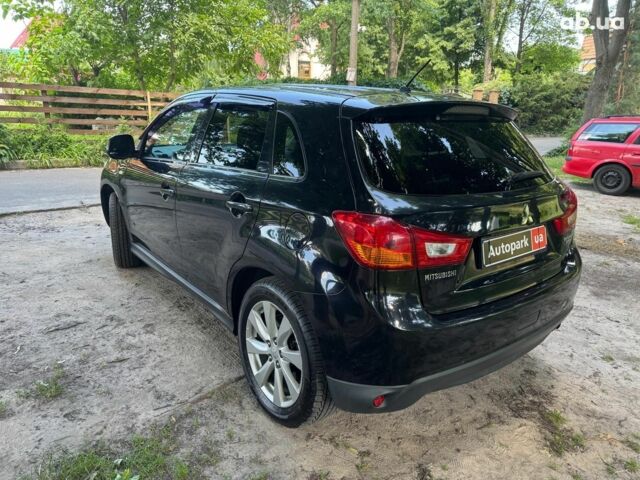 Черный Мицубиси Аутлендер, объемом двигателя 2 л и пробегом 195 тыс. км за 9990 $, фото 6 на Automoto.ua