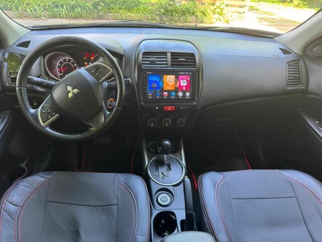 Черный Мицубиси Аутлендер, объемом двигателя 2 л и пробегом 195 тыс. км за 9990 $, фото 16 на Automoto.ua