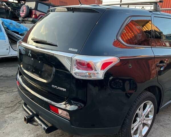 Черный Мицубиси Аутлендер, объемом двигателя 2.36 л и пробегом 226 тыс. км за 12499 $, фото 13 на Automoto.ua