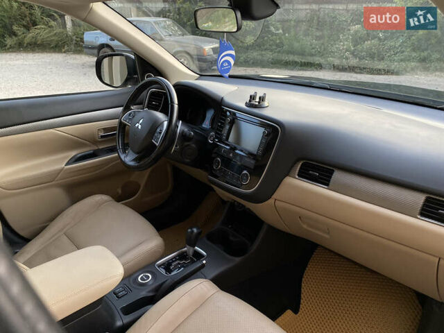 Черный Мицубиси Аутлендер, объемом двигателя 2.27 л и пробегом 241 тыс. км за 14400 $, фото 30 на Automoto.ua