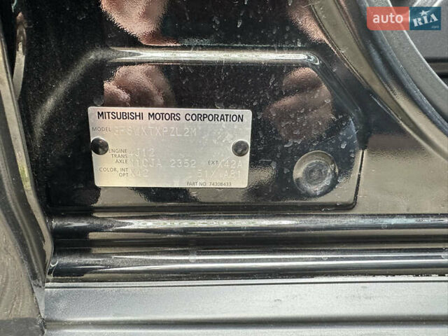 Черный Мицубиси Аутлендер, объемом двигателя 2.4 л и пробегом 150 тыс. км за 13700 $, фото 4 на Automoto.ua