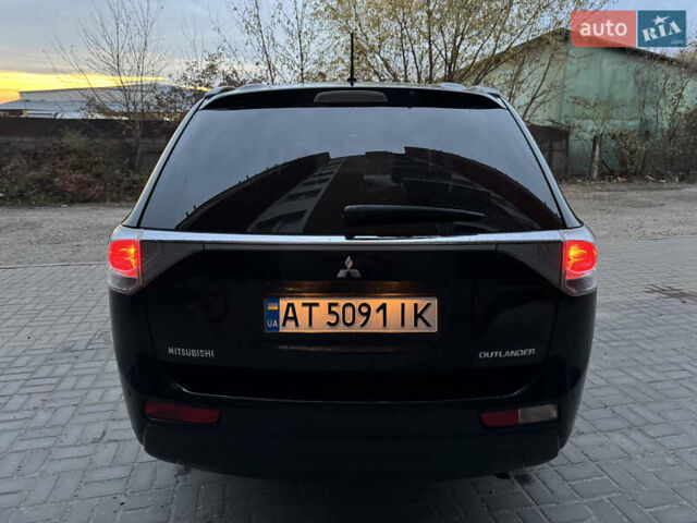 Черный Мицубиси Аутлендер, объемом двигателя 2.27 л и пробегом 241 тыс. км за 14400 $, фото 15 на Automoto.ua