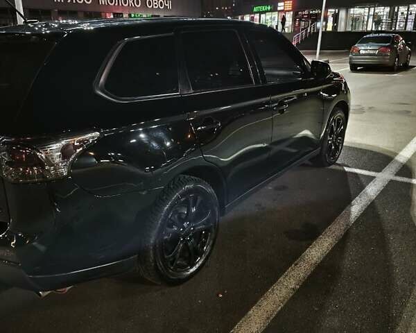 Черный Мицубиси Аутлендер, объемом двигателя 2.36 л и пробегом 226 тыс. км за 12499 $, фото 30 на Automoto.ua