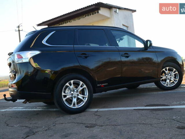 Чорний Міцубісі Аутлендер, об'ємом двигуна 2.2 л та пробігом 237 тис. км за 12550 $, фото 33 на Automoto.ua