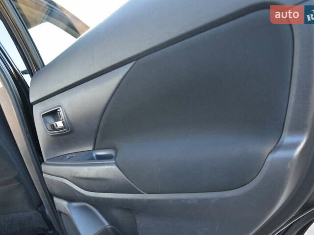 Чорний Міцубісі Аутлендер, об'ємом двигуна 2.2 л та пробігом 237 тис. км за 12550 $, фото 51 на Automoto.ua