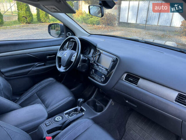 Черный Мицубиси Аутлендер, объемом двигателя 2 л и пробегом 190 тыс. км за 12500 $, фото 28 на Automoto.ua