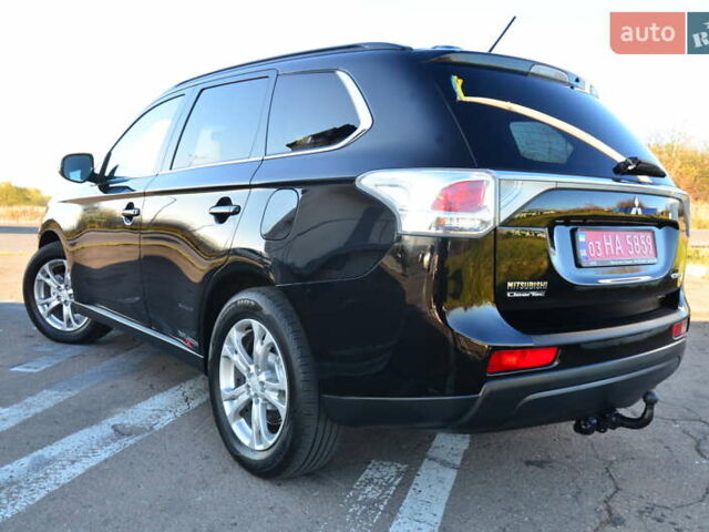 Чорний Міцубісі Аутлендер, об'ємом двигуна 2.2 л та пробігом 237 тис. км за 12550 $, фото 26 на Automoto.ua