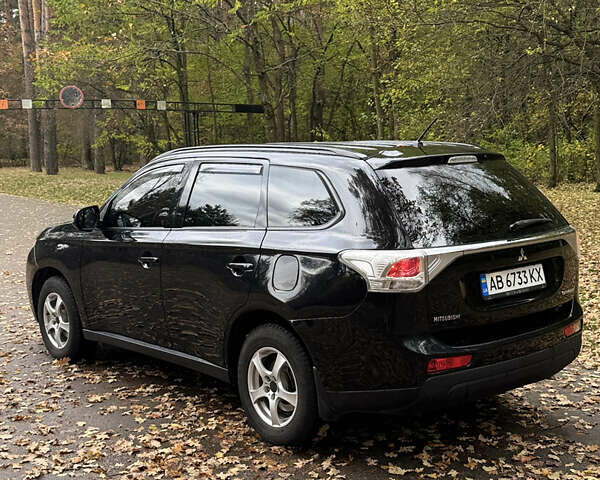 Міцубісі Аутлендер 2013 у Броварах на Automoto.ua Чорний Міцубісі Аутлендер, об'ємом двигуна 2.36 л та пробігом 168 тис. км за 11700 $, фото 4 на Automoto.ua