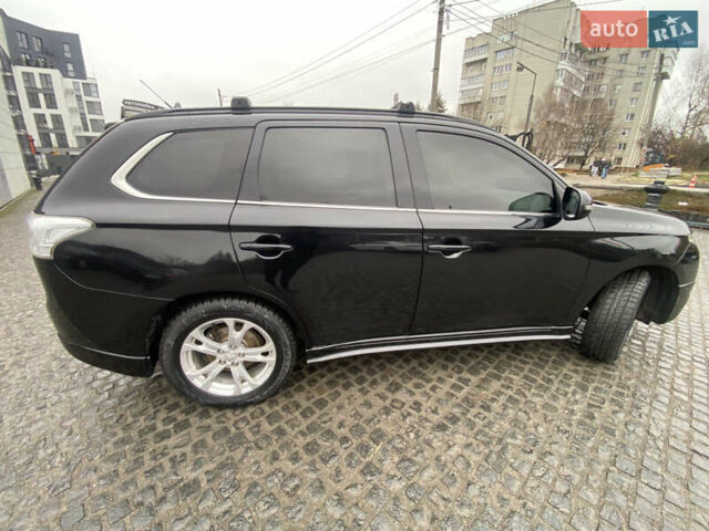 Черный Мицубиси Аутлендер, объемом двигателя 2.27 л и пробегом 280 тыс. км за 11808 $, фото 17 на Automoto.ua