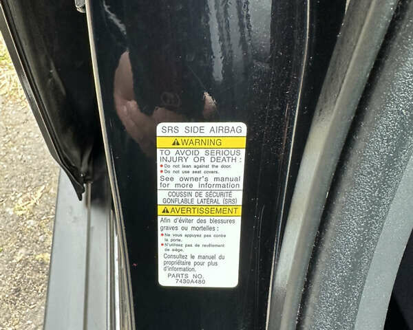 Черный Мицубиси Аутлендер, объемом двигателя 2.4 л и пробегом 150 тыс. км за 13700 $, фото 5 на Automoto.ua