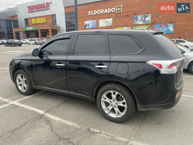 Черный Мицубиси Аутлендер, объемом двигателя 2.4 л и пробегом 150 тыс. км за 13700 $, фото 16 на Automoto.ua