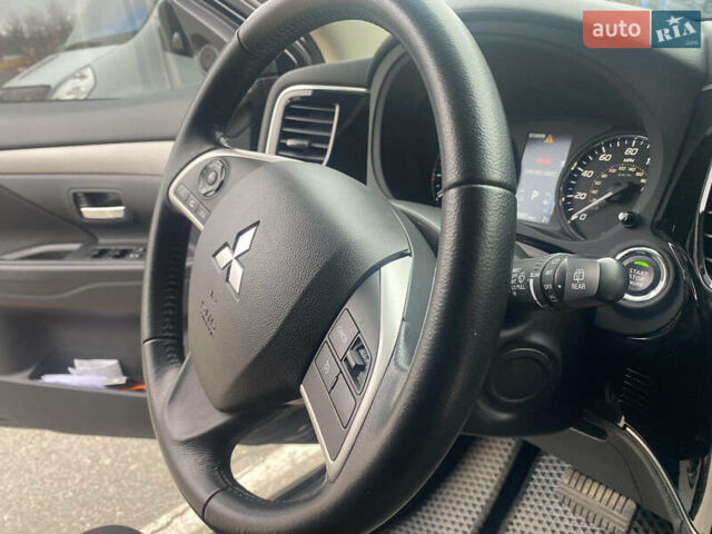 Черный Мицубиси Аутлендер, объемом двигателя 2.4 л и пробегом 150 тыс. км за 13700 $, фото 6 на Automoto.ua