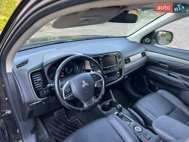 Черный Мицубиси Аутлендер, объемом двигателя 2 л и пробегом 190 тыс. км за 12500 $, фото 19 на Automoto.ua