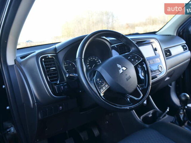 Чорний Міцубісі Аутлендер, об'ємом двигуна 2.2 л та пробігом 237 тис. км за 12550 $, фото 35 на Automoto.ua