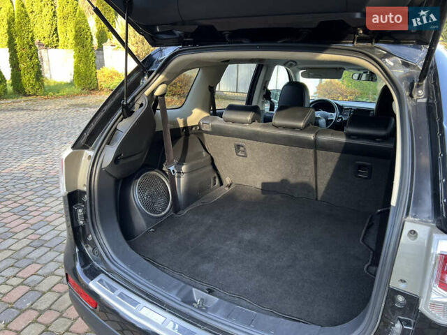 Черный Мицубиси Аутлендер, объемом двигателя 2 л и пробегом 190 тыс. км за 12500 $, фото 24 на Automoto.ua