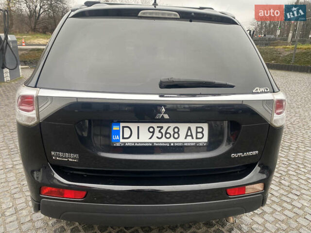 Черный Мицубиси Аутлендер, объемом двигателя 2.27 л и пробегом 280 тыс. км за 11808 $, фото 4 на Automoto.ua