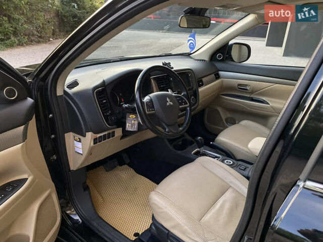 Черный Мицубиси Аутлендер, объемом двигателя 2.27 л и пробегом 241 тыс. км за 14400 $, фото 51 на Automoto.ua