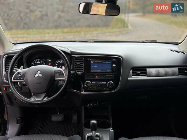 Міцубісі Аутлендер 2013 у Броварах на Automoto.ua Чорний Міцубісі Аутлендер, об'ємом двигуна 2.36 л та пробігом 168 тис. км за 11700 $, фото 20 на Automoto.ua