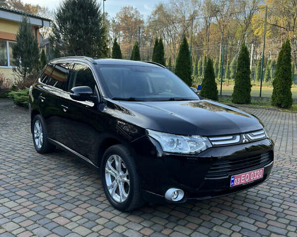 Черный Мицубиси Аутлендер, объемом двигателя 2 л и пробегом 190 тыс. км за 12500 $, фото 8 на Automoto.ua