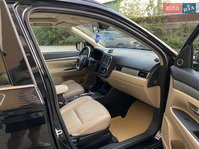 Черный Мицубиси Аутлендер, объемом двигателя 2.27 л и пробегом 241 тыс. км за 14400 $, фото 26 на Automoto.ua