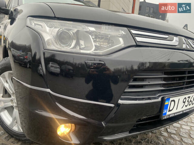 Черный Мицубиси Аутлендер, объемом двигателя 2.27 л и пробегом 280 тыс. км за 11808 $, фото 3 на Automoto.ua