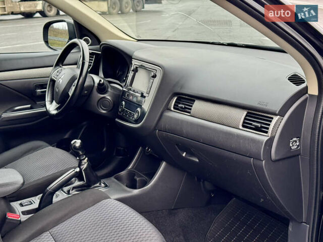 Черный Мицубиси Аутлендер, объемом двигателя 2.2 л и пробегом 250 тыс. км за 12750 $, фото 31 на Automoto.ua